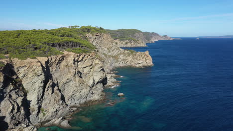 Cliffs-of-Porquerolles-rocky-landscape-Hyères-island-France-aerial-traveling-sun